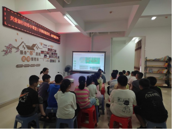 学辨真假货币涵养诚信少年兴业识币小课堂走进社区公益暑托班(图1)